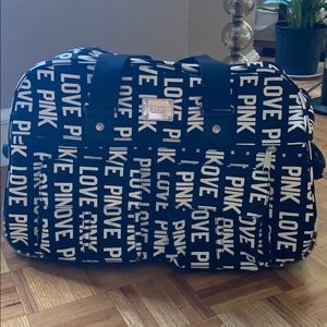 Pink rolling tote with handle